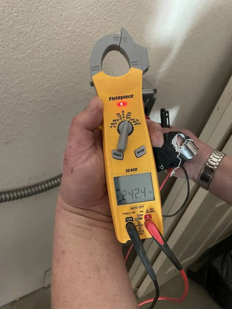 Voltage testing with clamp meter during Aluminum Wiring Replacement in South Kingstown